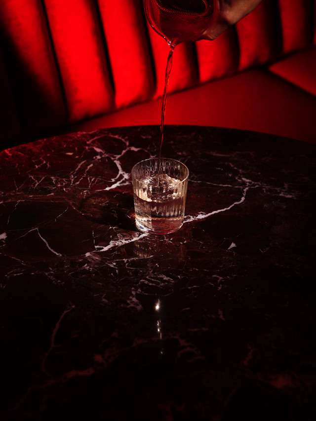 Pouring over ice at the bar