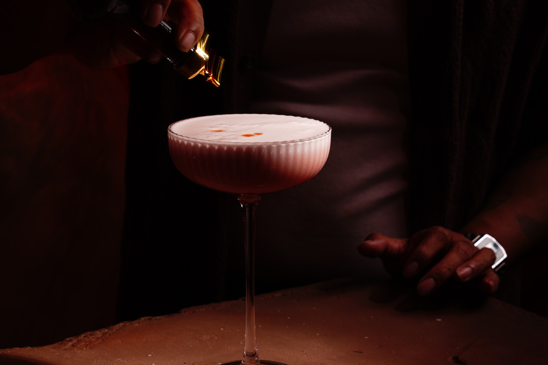 A coupe glowing on the onyx bar