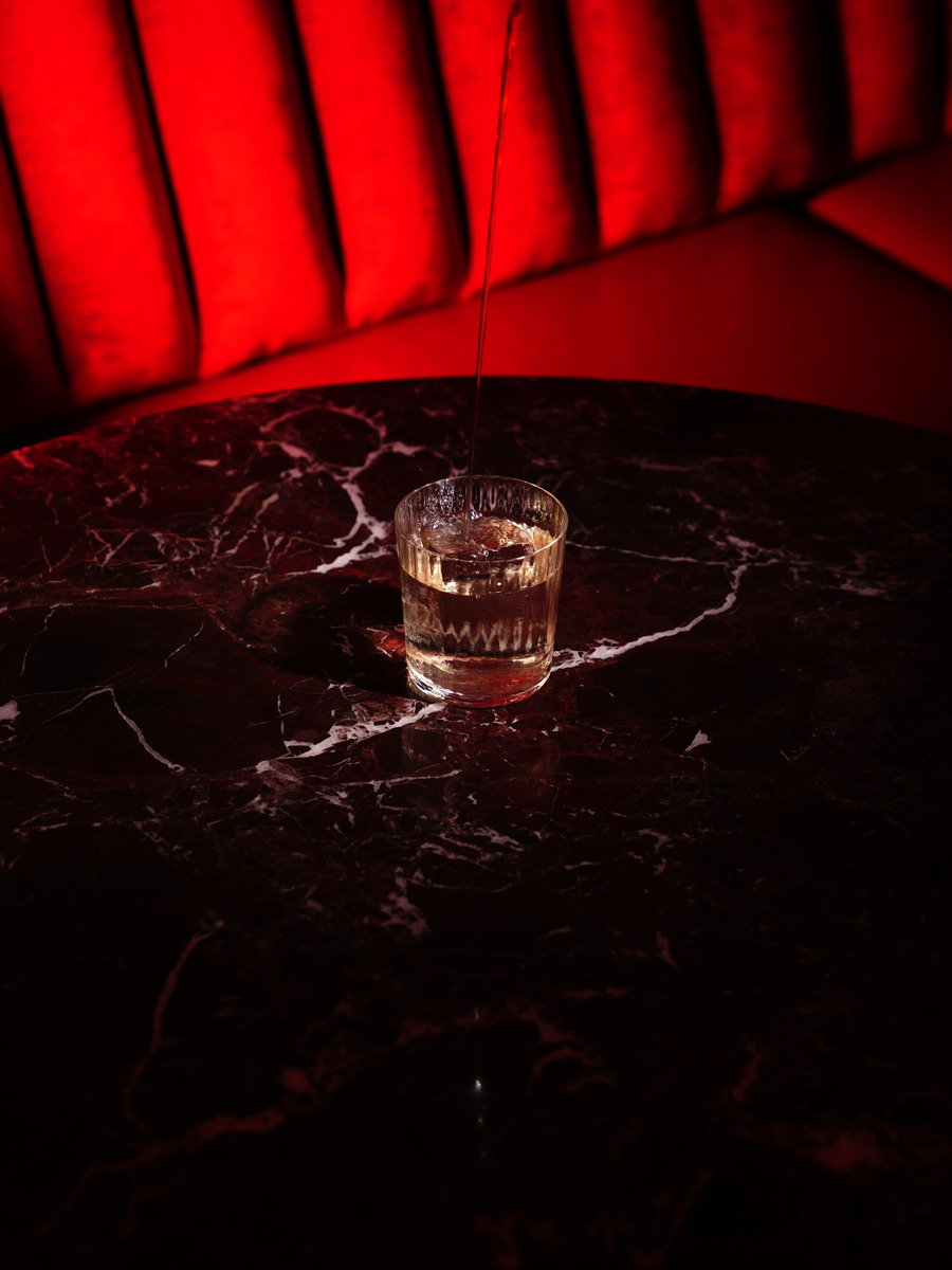 The glowing onyx bar at the centre of the cave